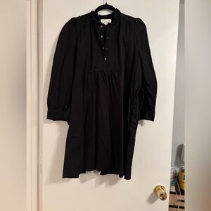 Pomander Place black dress with gold buttons